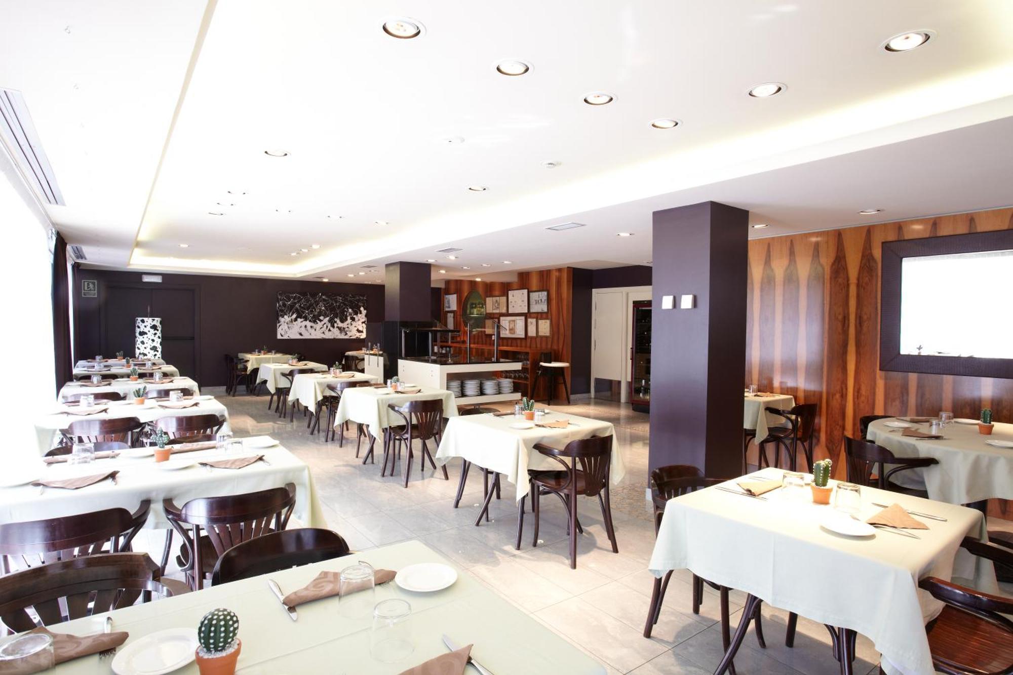 Hotel Mu La Cortinada Nhà hàng bức ảnh